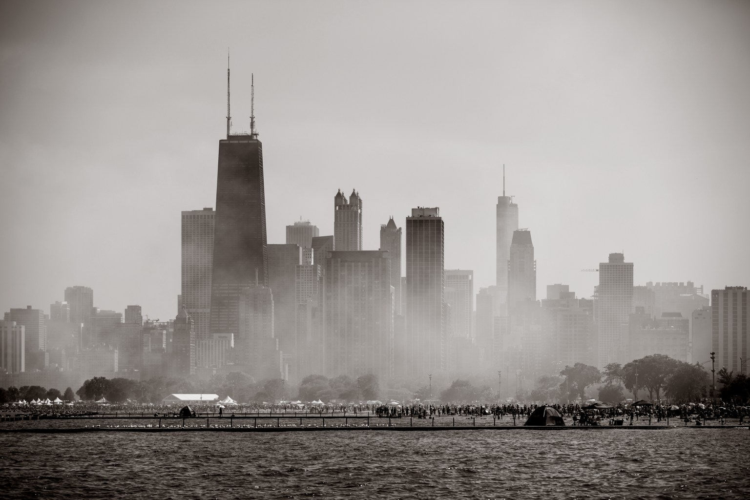 Smoke residue after The Air & Water show changes Chicago's skyline view from North Ave. beach on Saturday, August 19, 2017. | Santiago Covarrubias/For the Sun-Times